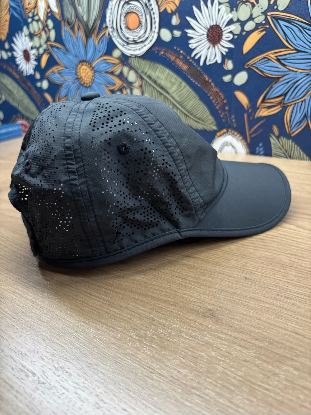 Nike Women's Perdorated Black Cap with White Swoosh